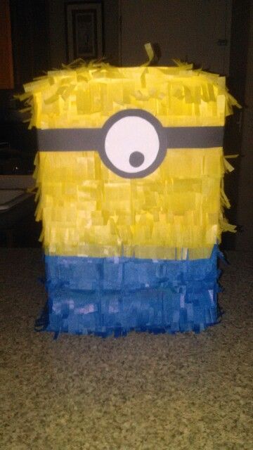 Minion pinata- made from a cereal box and tissue paper! Minion Pinata, Mexican Fiesta Party, Piñata Ideas, Fiesta Party, School Project, School Projects, Cereal Box, Tissue Paper, Birthday Party Themes