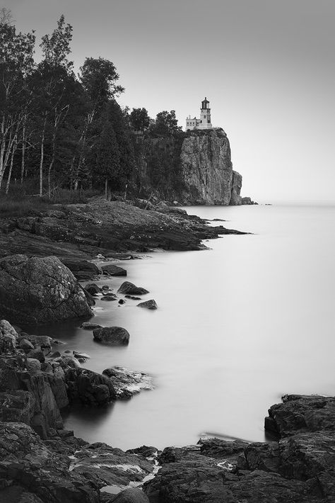 SILVER BAY, MINNESOTA  Fine Art Limited Edition of 50  Split Rock Lighthouse was built in response to the great loss of ships during the famous Mataafa Storm of 1905, in which 29 ships were lost on Lake Superior. It is built on a 133-foot sheer cliff eroded by wave action from a diabase sill containing inclusions of anorthosite. Photo © copyright by Max Foster #splitrock #lighthouse #minnesota #duluth #northshore #lakesuperior #maxfosterphotography Superior Walls, Split Rock Lighthouse, Silver Bay, Photography Monochrome, Split Rock, Lighthouse Print, Outdoor Photographer, Monochrome Prints, House Photography