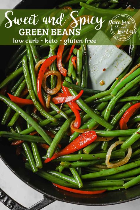 These Sweet and Spicy Green Beans are the perfect balance of sweet and savory, with a kick of spice. Fresh haricot vert green beans, blanched and then sautéed with onions and bell peppers - tossed with a rich, buttery sauce made with soy sauce, garlic, crushed red pepper and brown sugar substitute. It is the perfect Asian inspired low carb side dish. It can be ready and on the table in less than 30 minutes. | Peace Love and Low Carb Paleo Green Bean Recipes, Recipes For Green Beans, Beans Dishes, Paleo Green Beans, Spicy Green Bean Recipes, Best Green Beans, Green Bean Dishes, Spicy Green Beans, Peace Love And Low Carb