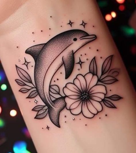 Dolphin And Flower Tattoo, Tattoo Dolphin, Dolphin Tattoo, Maching Tattoos, Tattoo Over Scar, Dolphins Tattoo, Free Tattoo Designs, Star Tattoo Designs, Small Girl Tattoos