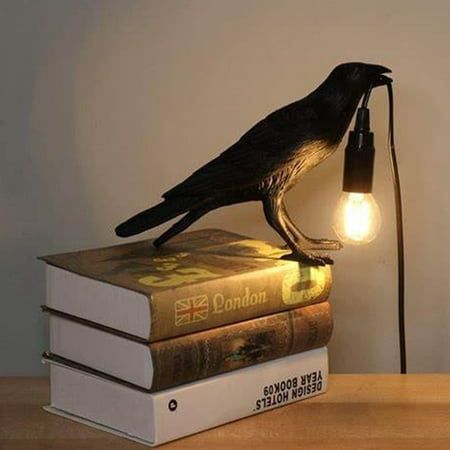 This is a sturdy and beautiful raven desk lamp. Assembly is super easy. It just happens to have a slightly open beak that just grabs onto the cord of a black lamp base. You can always remove the rope from the crow's beak and let the bulb hang higher or lower depending on your preference. Specification: Light Source Type: E12 LED Voltage: 110-220 V Material: Plastic Size: 11.6 x 4.7 x 7 inchs Style: Modern Room Type: Bedroom, Living Room, Baby Room, Home Office Package Included: 1 x Raven Table L Black Lamp Base, Led Bedroom, Bedside Wall Lights, Bedroom Table, Table Lights, Wooden Table Lamps, Light Bedroom, Modern Art Decor, Table Lamps For Bedroom