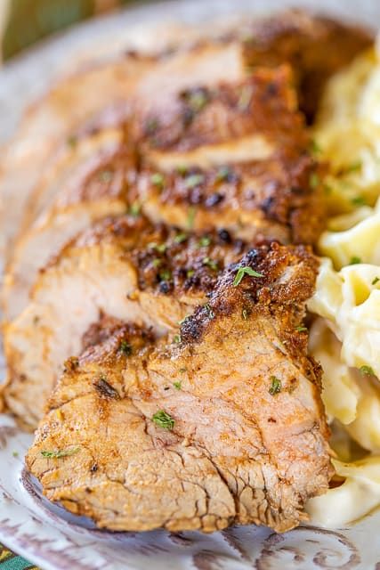 Blackened Pork Tenderloin - the BEST pork tenderloin EVER! SO much amazing flavor! Pork is marinated overnight in a mixture of garlic, onion, thyme, oregano, paprika, tarragon, salt, red pepper, black pepper, olive oil and Worcestershire sauce. Quickly pan sear the pork tenderloins and finish off in the oven. SO easy and delicious! Leftover are great on roll with remoulade sauce. Don't miss this one! #pork #porktenderloin Pan Veggies, Best Pork Tenderloin, Slow Cooker Red Beans, Balsamic Pork Tenderloins, Slow Cooker Jambalaya, Pork Tenderloins, Chicken Ranch Pasta, Balsamic Pork, Tenderloin Roast