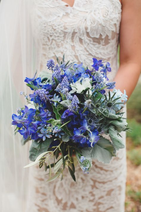 Belladonna Delphinium, muscari, scabiosa, veronica, thistle, and hyacinth in blue tones February Wedding Flowers, Wildflower Bridal Bouquets, Wildflower Wedding Bouquet, Wedding Flower Guide, Bridal Bouquet Blue, February Wedding, Something Blue Bridal, Blue Wedding Bouquet, Gladioli