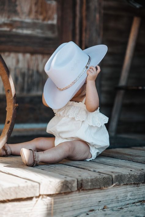 Baby cowgirl 1 Year Cowgirl Pictures, Cowgirl First Birthday Photoshoot, Western 6 Month Baby Picture Ideas, Farm One Year Old Pictures, Baby Cowgirl Photoshoot, Western 1 Year Pictures, Cowgirl First Birthday Pictures, Western Baby Photo Shoot, Cowgirl 1st Birthday Photoshoot