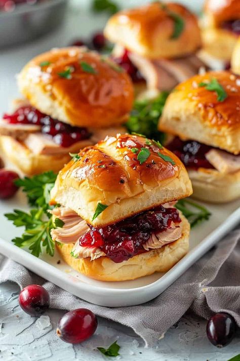 A tray of Leftover Turkey Sliders filled with succulent turkey and cranberry sauce on sweet rolls, garnished with fresh parsley and served with cranberries on the side. Savory Turkey And Cranberry Ring, Leftover Turkey Sliders, Leftover Turkey Curry, Turkey And Cranberry, Leftover Ideas, Turkey Curry, Sweet Dinner Rolls, Turkey Sliders, Turkey Cranberry