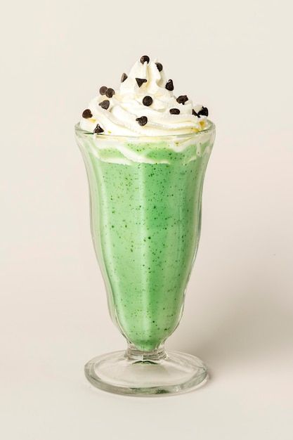 Matcha smoothie topped with whipped crea... | Premium Photo #Freepik #photo #chocolate-milkshake #milkshake #chocolate-shake #shake