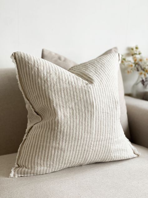 This beautiful country style linen cushion is perfect for a neutral or country style interior. It comes in a large 45x45cm which is sure to make a statement in any room. This cushion comes with a 1cm fringing on the sides and comes with a duck feather pad included.  Dimensions: 45x45, 50x30, 53x53. *please note we also have a website with a 10% off introductory offer on all first orders - www.ellenvaleinteriors.com* Sofa Cushions Arrangement, Country Style Interiors, Neutral Cushions, Cream Cushions, Grey Home Decor, Striped Cushions, Beige Cushions, Duck Feather, Ticking Stripe