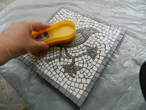 Scrubbing the mosaic to remove grout residue. Grouting Mosaics, Mosaic Trivet, How To Grout, Curbside Appeal, Trivets Diy, Advent Crafts, Mosaic Tiles Crafts, Direct Method, Music Supplies