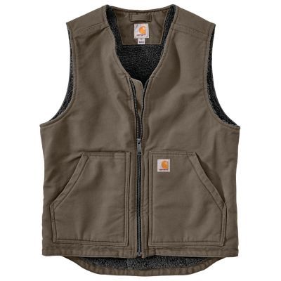 The Carhartt Men's Washed Duck Sherpa-Lined Vest is a versatile layer built to pack on extra warmth right where it matters most. The men's sherpa-lined vest is made of our signature heavyweight cotton duck, and has a warm Sherpa lining to take on chilly weather. This sherpa-lined vest is the perfect addition to any outfit. Made with 12 oz. 100% ringspun cotton washed duck for comfort Triple-stitched main seams for durability Two sherpa-lined front pockets and two inner pockets Sherpa-fleece lining for added warmth Full center-front zipper for easy on and off Sherpa-lined vest with droptail hem for a unique look Imported Carhartt Vest, Vest For Men, Weighted Vest, Mens Sherpa, Collar Vest, Sherpa Vest, Big Clothes, Tractor Supply, Outerwear Vest