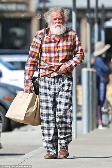 His look: Nick Nolte likes to be as comfortable as can be it seems. When heading out for a grocery run in Malibu on Sunday, the 77-year-old actor wore a partially unbuttoned plaid shirt with his pajama bottoms Nick Nolte, Tim Roth, Grey Slacks, Pajama Bottoms, Mens Pajamas, Pajama Shirt, Man Alive, Old Man, Pop Star