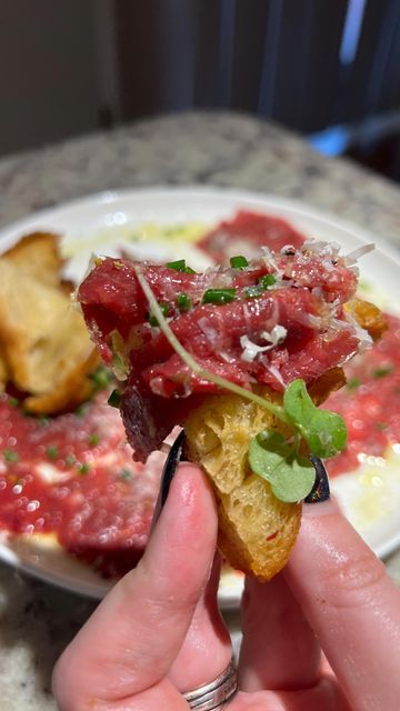 Suzy ❤️‍🔥🤘 on Instagram: "My go app to order when I go out to eat is always beef carpaccio and it’s really easy to make ay home! @goldensteersteakco sent me these filets to try and I was so excited to do a carpaccio with them! The most important part is to cut against the grain so when you flatten it out it will tenderize and meat perfectly! I used a metal rolling pin to flatten my tenderloin you don’t need anything super fancy. I seasoned the beef with olive oil, pepper, lemon caperberry salt Beef Carpaccio, Out To Eat, Against The Grain, When I Go, I Want To Eat, Caramelized Onions, Rolling Pin, So Excited, Olive Oil