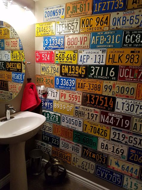 License Plate Ceiling, License Plate Wall Ideas, Mechanic Shop Bathroom Ideas, Race Car Bathroom Ideas, Mechanic Bathroom, License Plate Display Ideas, Car Themed Restaurant, Car Themed Bathroom, License Plate Wall