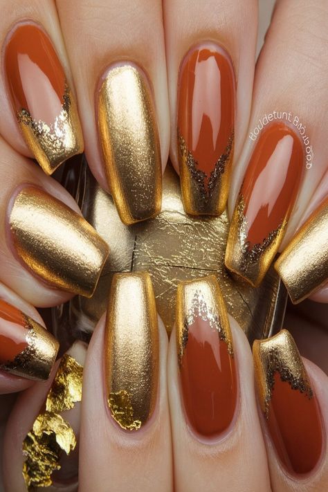 Add a touch of luxury to your nails with this Burnt Orange and Gold Leaf Nail Art. Featuring a glossy burnt orange base with unique metallic gold accents at the tips, this design combines smooth gold finishes and irregular, flaked textures that resemble gold leaf. Burnt Orange And Gold Nails, Orange And Gold Nails, Gold Leaf Nail Art, Leaf Nail Art, Orange And Gold, Gold Nails, Metallic Gold, Gold Leaf, Gold Accents