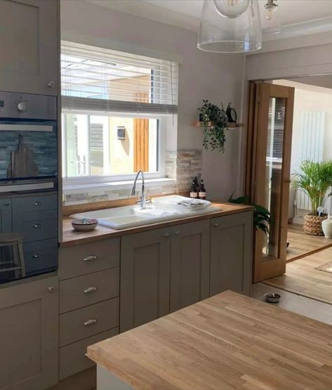 It is so easy to switch up your home decor with a lick of Frenchic. 🤍🌾 Frenchic Fan Forum member Debbie Davies transformed her gloss kitchen not once but twice with Frenchic! First off using our soft and neutral, quirky khaki shade' Funky Dora' (from The Lazy Range) before changing it up by going bold in black with our true black shade 'Blackjack' from the Al Fresco Inside/ Outside Range. . . #furniturerefurbishing #furniturerefurbished #furniturerefurbish #furniturerefinishing #furnitureref... Gloss Kitchen, Black Shade, Inside Outside, Refinishing Furniture, Shades Of Black, Fan, Furniture, Home Decor, Fresco