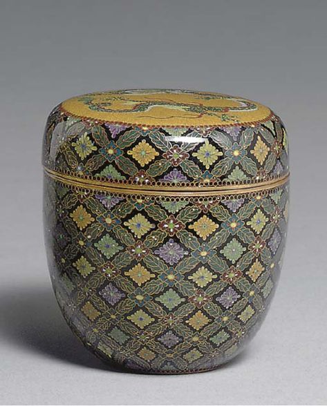 A Cloisonné Enamel Tea Caddy Meiji period (19th century), signed Kyoto Namikawa [workshop of Namikawa Yasuyuki, 1845-1927] Designed in colored enamels and worked in silver wires on the cover with a circular panel of a coiling dragon on a mustard-yellow ground, the sides of the cover and body designed in gilt wire with a floral diaper pattern, the mounts gilt metal; signed on a silver tablet mounted on base 2 5/8in. (6.8cm.) high Namikawa Yasuyuki, Japanese Tea Ceremony, Meiji Period, Tea Canisters, Large Image, Japanese Porcelain, Korean Art, Tea Caddy, Tea Art