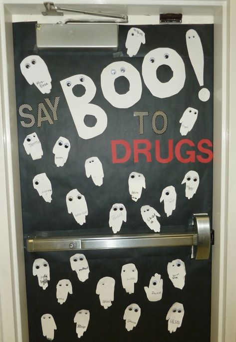 Say Boo to Drugs door with handprint ghosts - Red Ribbon Week - Light Bulbs and Laughter. Frankenstein Door, Halloween Door Decorations Classroom, School Door Decorations, Bad Choices, Red Ribbon Week, School Doors, Door Decorating, Room Mom, Fall Door Decorations