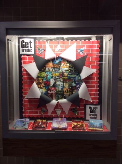 School Display Case Ideas, Library Window Displays, Bulletin Boards Christmas, Graphic Novel Display, Bulletin Boards School, Bulletin Boards Elementary, School Library Book Displays, School Library Bulletin Boards, Comic Book Display