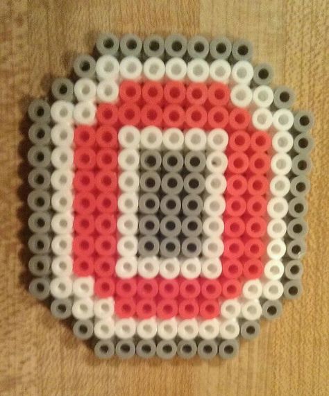 Ohio State melty beads Ohio State Pixel Art, Ohio State Buckeyes Crochet Patterns, Ohio State Perler Bead Patterns, Ohio State Crafts, Buckeye Crafts, Melty Bead Patterns, Fuse Bead Patterns, Perler Bead Templates, Diy Perler Bead Crafts