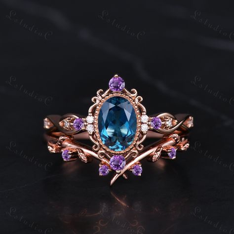 5x7mm Art Deco Oval London Blue Topaz Bridal Ring Set Vintage Amethyst Leaf Engagement Ring Antique Women Promise Anniversary Ring Unique Gift Side stones: amethyst and moissanite This ring can also be made in genuine solid 10k, 14k, 18k gold or Platinum, and all the rings in my shop can be customized too! If you want to know more details about the ring, just contact with me anytime! If you want to customize the ring, just contact with me anytime! If you want to make a custom jewelry, just conta Tanzanite Wedding Rings, Enchanted Rings, Amethyst Ring Vintage, Engagement Ring Antique, Tiaras Jewellery, Leaf Engagement Ring, Cute Engagement Rings, Future Engagement Rings, London Blue Topaz Ring