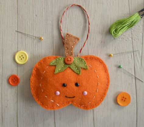 Make and sew a cute pumpkin decoration for halloween. Suitable for a beginner or an established sewer. Each kit is packaged in eco freindly packaging with a reusable box which has a luggage tag attached which can all be recycled Kit contents; wool mix felt, trims and decorations, stuffing, a needle, pins,embroidery thread,  easy to follow instructions and templates. You will need a pair of scissors and a pencil. This product contains small parts so not suitable for under 3 years and not suitable Pumpkin Sewing, Halloween Felt Crafts, Halloween Craft Kits, Halloween Sewing Projects, Decoration For Halloween, Halloween Decorations For Kids, Felt Sewing, Halloween Sewing, Halloween Table Runners