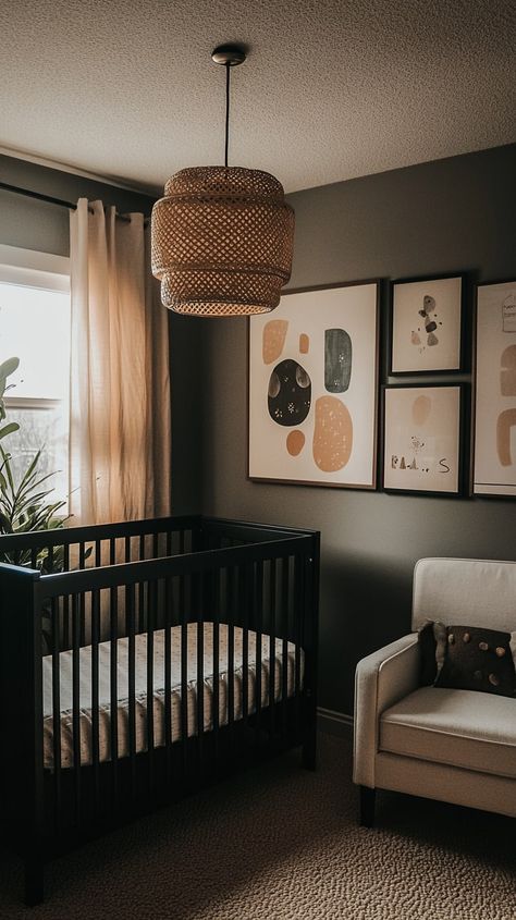 Modern gender-neutral nursery with a black crib, white armchair, abstract wall art, and natural light from large windows. Modern Boys Nursery, Nursery With Grey Crib, Wooden Crib Nursery, Modern Nursery Boy, Nautical Theme Nursery, Gender Neutral Nursery Design, Wooden Crib, Modern Boy Nursery, Nursery Design Neutral