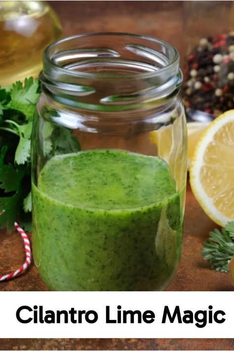 Glass jar of green cilantro lime dressing next to fresh cilantro, lemon halves, and assorted spices. Mint Dressing, Quinoa Spinach, Seasoned Rice Vinegar, Drying Cilantro, Easy Salad Dressing, Cilantro Lime Dressing, Fresh Salad Recipes, Cucumber Tomato Salad, Easy Salad