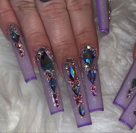 Lavender Rhinestone Nails, Baddie Bling Nails Purple, Long Bedazzled Nails, Nails With Purple Rhinestones, Purple Bling Nails Rhinestones, Long Nail Designs With Rhinestones, Purple Rhinestone Nail Designs, Purple Nail Ideas Acrylic, Long Pink Nails With Rhinestones