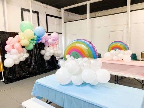 #rainbow #rainbowparty #rainbowbirthdayparty #pastel #tabeltoppers #centerpiece #tabledecor #clouds Pastel Rainbow Table Decorations, Pastel Rainbow Centerpiece Ideas, Rainbow Centerpiece Ideas, Rainbow Centerpiece, First Birthday Centerpieces, Rainbow Table, Party Table Centerpieces, Adoption Party, Rainbow Birthday Party