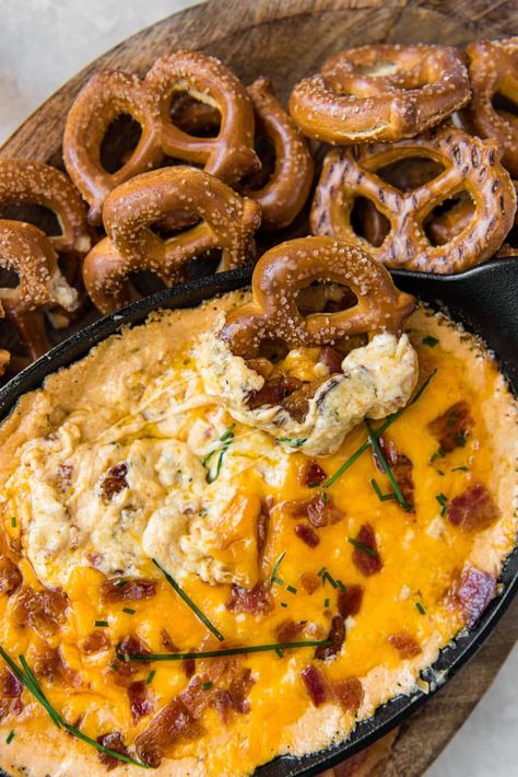 Hot Bacon Beer Cheese Dip is baked with flavorful cheeses, crisp bacon and your favorite lager. Serve with hard or soft preztels, bread or veggies. Pretzel Dip Recipes, Cheesy Snack, Beer Bacon, Beer Cheese Dip, Alec Guinness, Bacon Appetizers, Pretzel Dip, Beer Cheese, Soften Cream Cheese