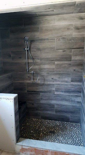 Grey Wood Bathroom Tile Shower Ideas Wood Tile Shower, Makeover Kamar Mandi, Bilik Air, Farmhouse Shower, Tile Remodel, Bad Inspiration, Bathroom Shower Tile, Bathroom Remodel Shower, Shower Tile Designs