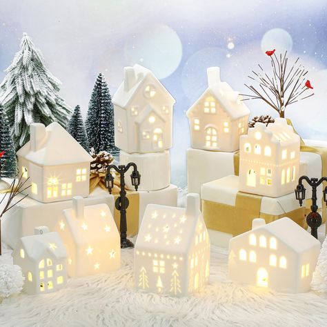 PRICES MAY VARY. 26 Pieces Christmas Villages Sets: the Christmas village accessories include 8 ceramic houses, 16 trees of different sizes and styles (2 bare branch trees with cardinal, 2 white round pine trees, 2 white long pine trees and 10 green pine trees), and 2 lamp posts, providing an extensive range for your festive decorations Quality Material: these Christmas village pieces are designed with the delicate craftsmanship; The houses are made of durable ceramic that ensures longevity and Ceramic Christmas Village, Christmas Village Decorations, Christmas Village Collections, Christmas Village Sets, Christmas Village Accessories, Lamp Posts, Christmas Tabletop Decor, Christmas Village Houses, Farmhouse Christmas Tree