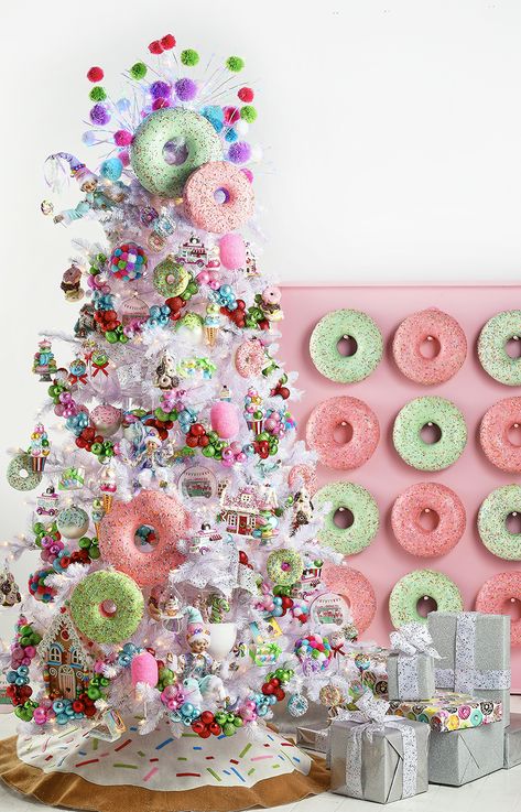 EXPLODING WITH BRIGHT, COLORFUL CONFECTIONS, THIS ASSORTMENT HAS ENOUGH TREATS TO SATISFY ANY SWEET TOOTH (EVEN SANTA’S). Raz Imports Christmas Trees, Christmas Tree Inspiration White, Sweet Treats Christmas, Donut Christmas Tree, Donut Christmas, Raz Imports Christmas, Treats Christmas, Country Christmas Trees, Christmas Tree With Snow