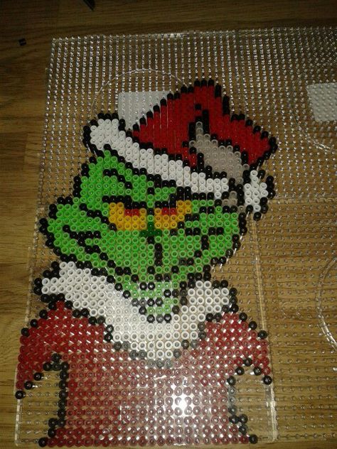 The grinch hama bead pattern. Mushroom Perler Beads, Mushroom Perler, Pixel Art Animals, Christmas Mushroom, Beads Perler, Christmas Perler Beads, Melty Bead Patterns, Perler Ideas, Holiday Beading