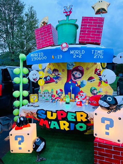 Mario Halloween Trunk Or Treat, Mario Kart Golf Cart Decor, Super Mario Golf Cart, Mario Truck Or Treat, Mario Parade Float Ideas, Trunk Or Treat Super Mario Theme, Super Mario Parade Float, Super Mario Bros Parade Float, Mario Golf Cart Decorations