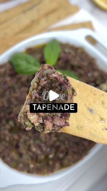 Isabelle Dunn | French Recipes on Instagram: "APERITIF OLIVE TAPENADE 🫒🍸🇫🇷

📍SAVE the recipe below👇🏼
 
Tapenade is a French classic from the Provence region. It’s fresh, bold, zesty and delicious! 

It’s great simply served as a dip with crostini or is super versatile used as flavour boost - spread over grilled fish, meat, as a base for a salad dressing, sprinkled over pizza or focaccia, roasties or even mixed into mash!

To make it vegan, simply omit the anchovies!👌🏼☀️

👉🏼Follow me @tastyfeedsdaily for more easy French recipes you can easily whip up at home. 

👩🏼‍🍳To make it, you will need…

1.5 cups mixed olives, pitted
¼ cup fresh basil 
1-2 tbsp drained capers
¼ cup extra virgin olive oil 
2 cloves garlic, minced
1-3 anchovies (optional)
1/2 lemon juice
Salt & pepper to t Easy French Recipes, Tapenade Recipe, Unique Recipe, Olive Tapenade, French Recipes, French Classic, Food Business, Grilled Fish, Tapenade