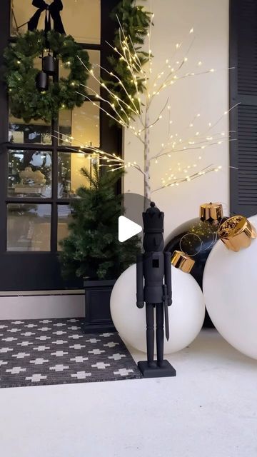 Juani  •  Modern Home Decor + Lifestyle on Instagram: "Lots of requests for this from porch decor✨

Sharing early because these items sell out!

I plan on recreating this Christmas front porch decor from last year. I loved the simplicity of it and how magical it felt at night ✨

Follow and comment LINKS for direct links sent to you 🖤

You can always shop my posts on the LTK app. Follow @the_sip_studio for all of my links and app exclusive content 🫶🏻

#christmasdecor #christmas #christmasdiy #nutcracker #nutcrackers #nutcrackerseason #homedecor #christmastime #christmasinspo #neutralchristmas #ltk #ltkhome #myhomevibe #christmaslights #frontporch #frontporchdecor #diy" Christmas Porch Nutcracker, Christmas Tree On Front Porch, From Porch Decor, Christmas Front Porch Decor, Christmas Entry, Christmas Front Porch, Front Porch Decor, Christmas Inspo, Front Porch Christmas Decor