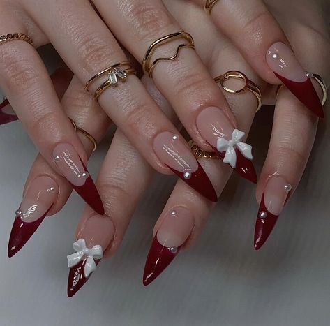 Red With Pearls Nails, Red Almond Nails With Rhinestones, Red French Tip Nails With Pearls, Red French Tip Stiletto Nails, White And Red Nails Ideas, Red Nails With Bow, Red Aesthetic Nails, White Red Nails, Red White Nails