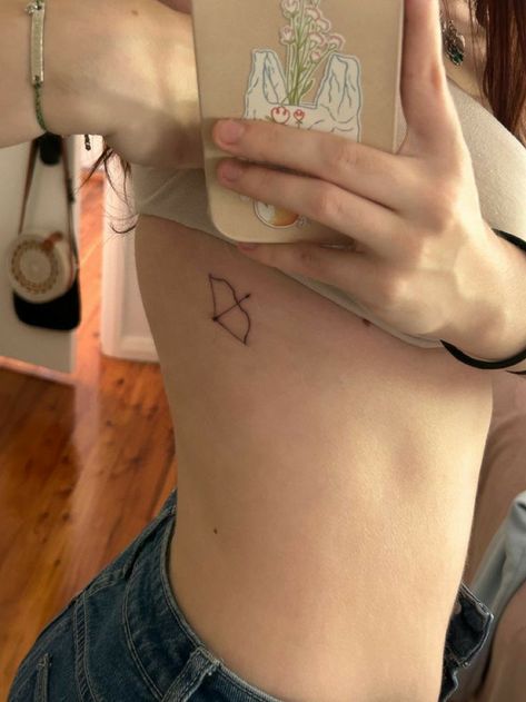 The archer taylor swift taylor cute little Tattoo Ideas Bow And Arrow, Style Tattoo Taylor Swift, Taylor Swift Trio Tattoo, Tattoo Ideas Reader, Tsoa Tattoo Ideas, Bow N Arrow Tattoo, Try Try Try Tattoo Taylor Swift, How And Arrow Tattoo, Taylor Swift Small Tattoo Ideas