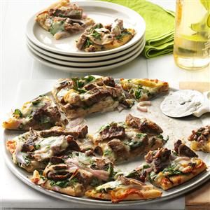 Garlic & Herb Steak Pizza Recipe -We crave pizza that’s super fast, cheesy and original. This one with steak and veggies is for folks who like their pie with everything on top. —Jade Fears, Grand Ridge, Florida Garlic Herb Steak, Leftover Steak Recipes, Steak And Veggies, Steak Pizza, Leftover Steak, Fantastic Recipes, Spring Dinner, Iron Rich Foods, Skirt Steak