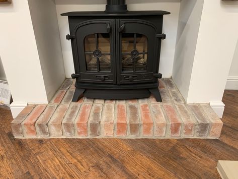 Fire Hearth Ideas, Brick Stove, Fire Hearth, Hearth Ideas, Fireplace Floor, Fireplace Showroom, Stove Design, Brick Hearth, Winter Reading