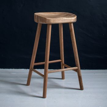 Eastburn | Storefront | notonthehighstreet.com Wooden Kitchen Stools, Bar Stools Uk, Oak Bar, Oak Bar Stools, Unusual Furniture, Oak Stool, Solid Wood Kitchens, Wooden Bar Stools, Stools For Kitchen Island