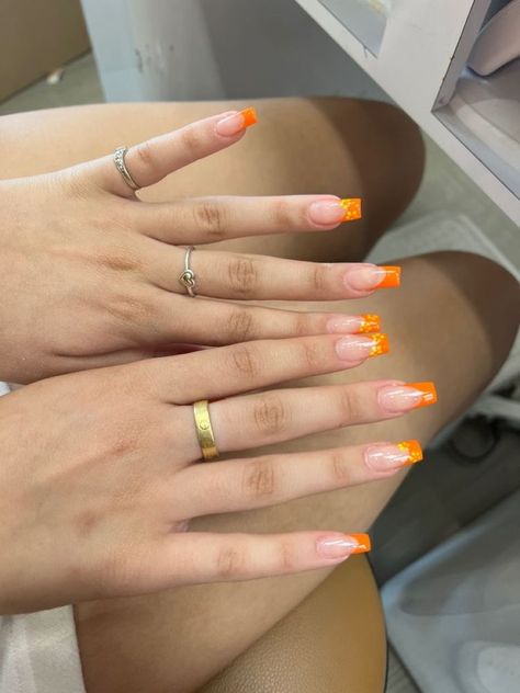 Orange French Tip Design Nails, Orange Nails Acrylic Flowers, Orange Nails Acrylic French Tip, Orange Tip Coffin Acrylic Nails, Orange French Tip Nails With Flowers, Acrylic Nails Summer Orange, Orange And Yellow French Tip Nails, French Tip Nails With Orange, Orange French Tip With Flowers