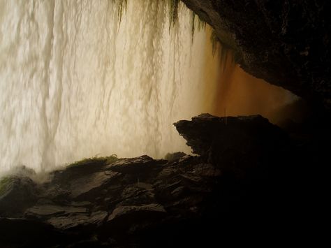 go behind a waterfall Behind Waterfall Caves, Hidden Cave Behind Waterfall, Cave Behind Waterfall, Behind Waterfall, Behind A Waterfall, Cave Waterfall, Misty Woods, Aesthetic Scenery, Cliff Face