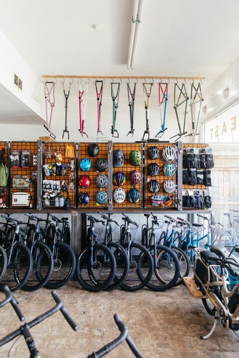 Garage Bike Shop, Bike Shop Aesthetic, Bike Shop Interior Design, Bicycle Shop Design, Cycle Store Design, Bike Cafe, Bicycle Cafe, Bike Storage Garage, Gear Room