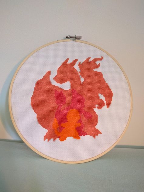 Charizard Cross Stitch, Cross Stitch Pokemon, Anime Cross Stitch Patterns, Charizard Evolution, Pokémon Crafts, Pokemon Embroidery, Pixel Pokemon, Pokemon Cross Stitch Patterns, Pokemon Cross Stitch