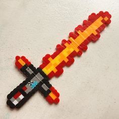 Kylo Ren's  Lightsaber - Star Wars VII perler beads by tigersbell Perler Beads Star Wars, Lightsaber Perler Beads, Starwars Beads Pattern, Star Wars Christmas Perler Beads, Darth Maul Perler Beads, Melts Beads, Kylo Ren Lightsaber, Star Wars Vii, Perler Creations