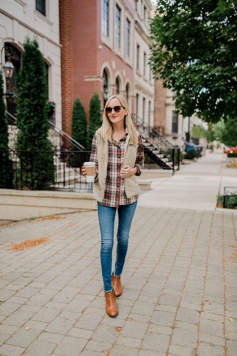 L.L.Bean “Slightly Fitted” Scotch Plaid Shirt (On sale! Use code “FALL20” to take 20 percent off your L.L.Bean order today.) / AG Jeans / Sam Edelman Booties (At Zappos in brown leather) / Patagonia Vest (In other colors here, and also love this quilted one and this “Better Sweater” one! Patagonia Sweater Vest Outfit, Llbean Style Fashion, Patagonia Better Sweater Vest Outfit, Patagonia Better Sweater Outfit, Patagonia Vest Outfit, Cabin Outfit, Patagonia Better Sweater Vest, Patagonia Style, Edgy Leather Jacket