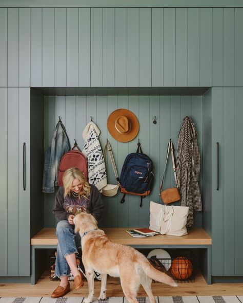 Mudrooms are the perfect space for styles that combine function with beautiful design elements. This mudroom makeover by @em_henderson shows us how it's done with overhead lighting, durable decorative baskets, and solid brass cabinet hardware that last through years of daily use. Cabinet Color: SW 6215 Rocky River; Wall Color: SW 7008 Alabaster | Design by @em_henderson, photo by @kaitlinmgreen_photo Em Henderson, Mudroom Makeover, Entry Closet, Just Magic, Brass Cabinet Hardware, Rocky River, Mudroom Design, Overhead Lighting, Mud Room