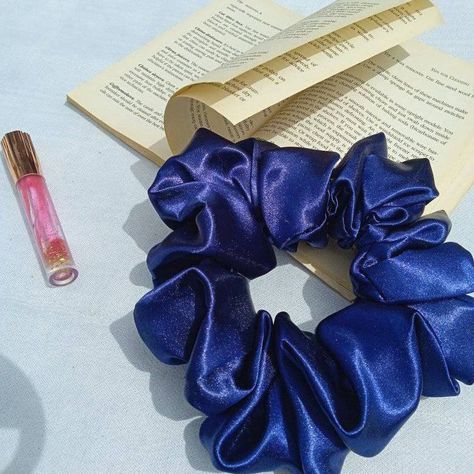 Blue scrunchie,white background, lipgloss and book in background Blue Satin, Hair Accessory, Scrunchies, Hair Accessories, Navy Blue, Satin, Instagram Photos, Photo And Video, Navy