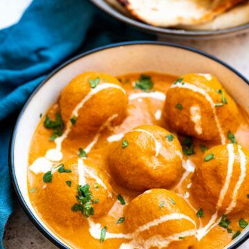 Malai Kofta - Caramel Tinted Life Kofta Recipe, Malai Kofta, Indian Diet, Stuffed Potato Balls, Tomato Gravy, Grated Potato, Red Chili Powder, Nutrition Labels, Garam Masala